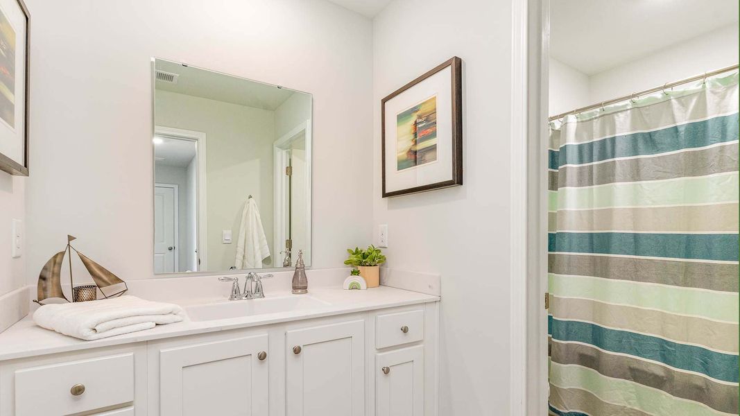 Furnished interior view inside a new home in The Bluffs at Mill Creek, Florence (Image 14).