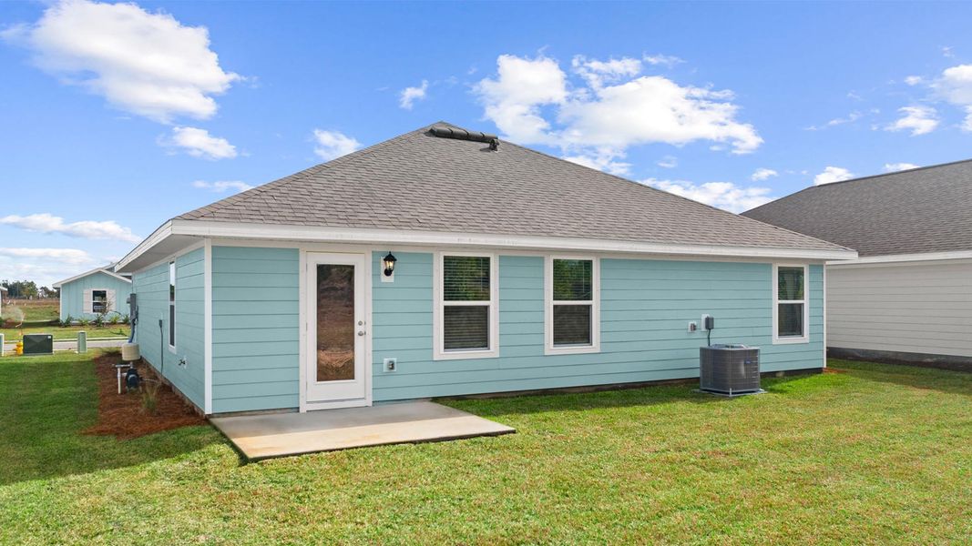 Exterior details and patio area of a home in Owl's Head Farms, Freeport (Image 4).