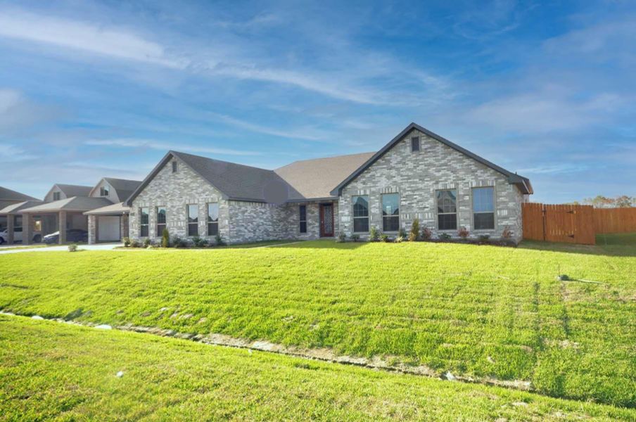 Front exterior of a new home in Pedregal, League City, TX, highlighting curb appeal (Image 25).