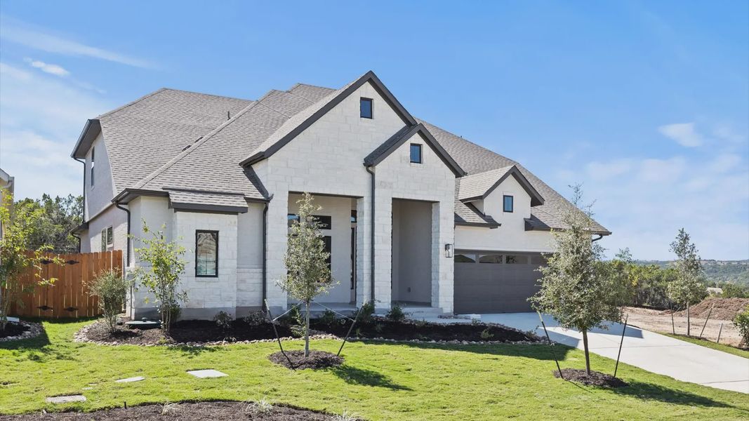 Representative exterior photo of a completed home built from the Raegan by Chesmar Homes in Sweetwater, Austin, TX (Image 15). Representative exterior photo of a completed home built from the Raegan by Chesmar Homes in Sweetwater, Austin, TX (Image 15).