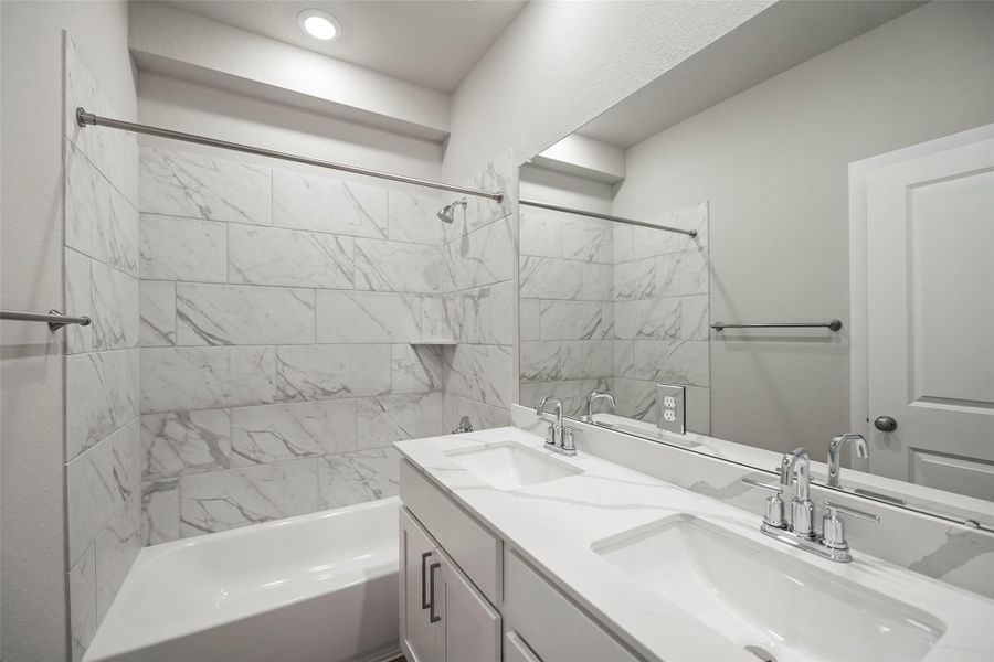 Beautifully designed bathrooms with sleek vanities and quality fixtures.