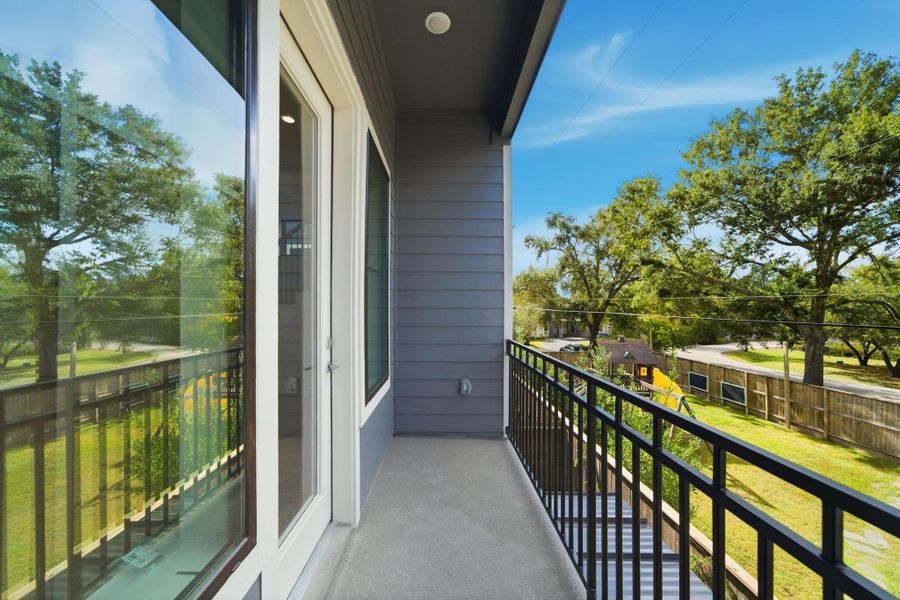 Exterior details and patio area of a home in Spring Valley Creek, Houston (Image 3).