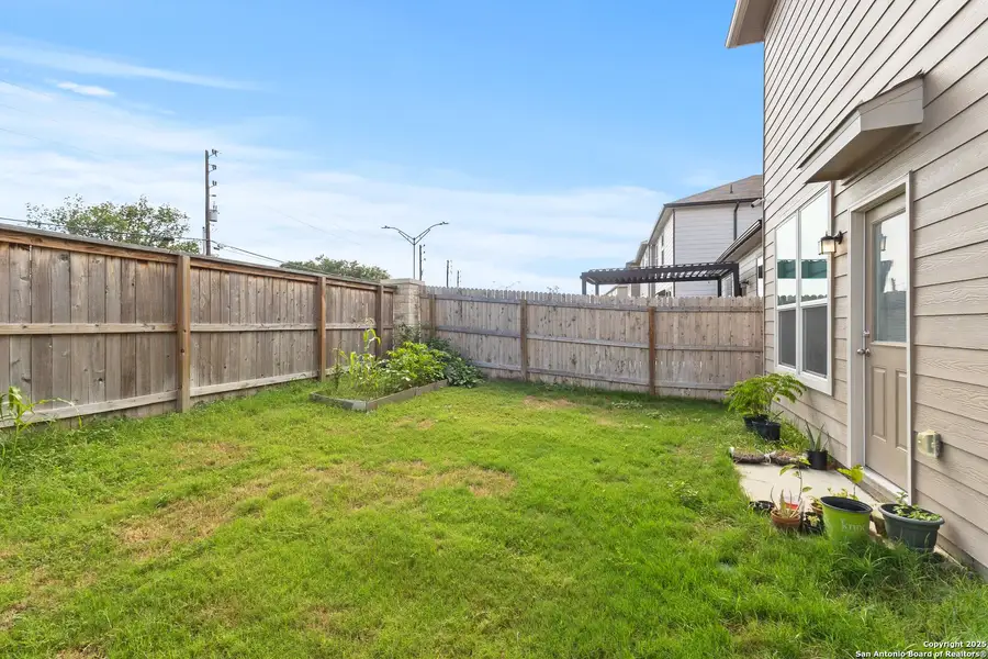 Exterior details and patio area of a home in Cove at Westover Hills, San Antonio (Image 4).