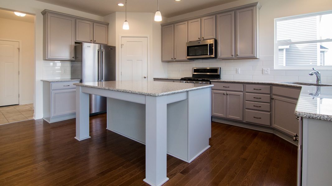 Representative furnished interior of a home built from the The Hartland by Norfolk Homes in Coronado Estates, Jackson (Image 37).