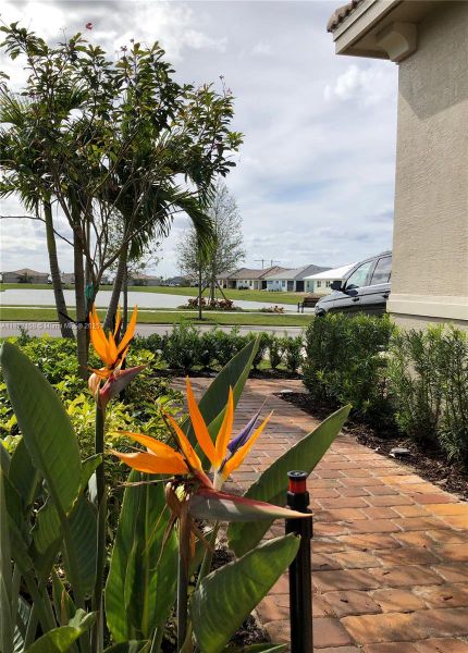 Exterior details and patio area of a home in PGA Village Verano, Port St. Lucie (Image 2).