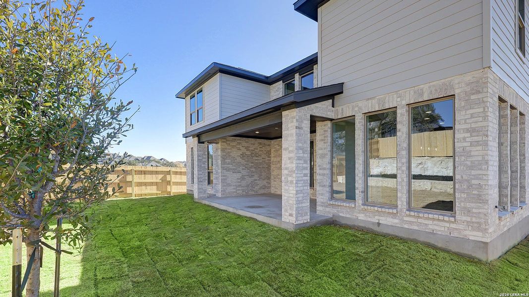 Exterior details and patio area of a home in The Ranches at Creekside, Boerne (Image 25).