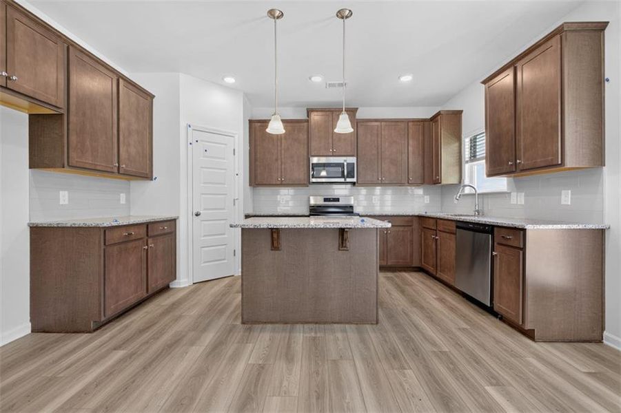 Furnished interior view inside a new home in Summerfield Place, Carrollton (Image 4).