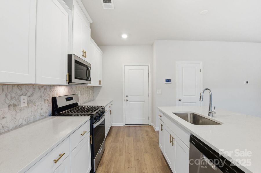 Furnished interior view inside a new home in , York (Image 8). Furnished interior view inside a new home in , York (Image 8).