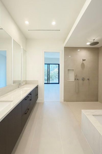 Flooring features large porcelain tile from Spain.