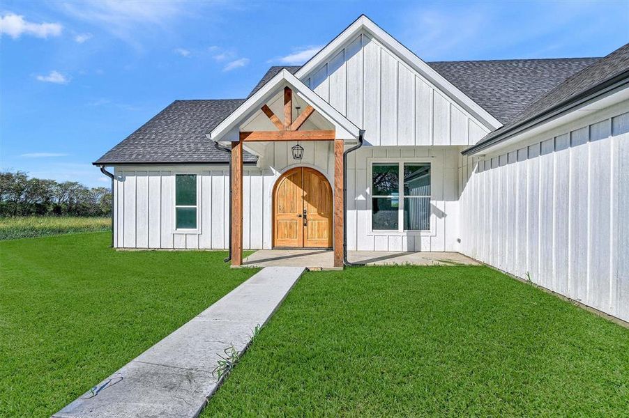 Exterior details and patio area of a home in , Savoy (Image 4). Exterior details and patio area of a home in , Savoy (Image 4).