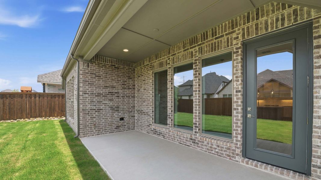 Exterior details and patio area of a home in Ventana, Fort Worth (Image 3). Exterior details and patio area of a home in Ventana, Fort Worth (Image 3).