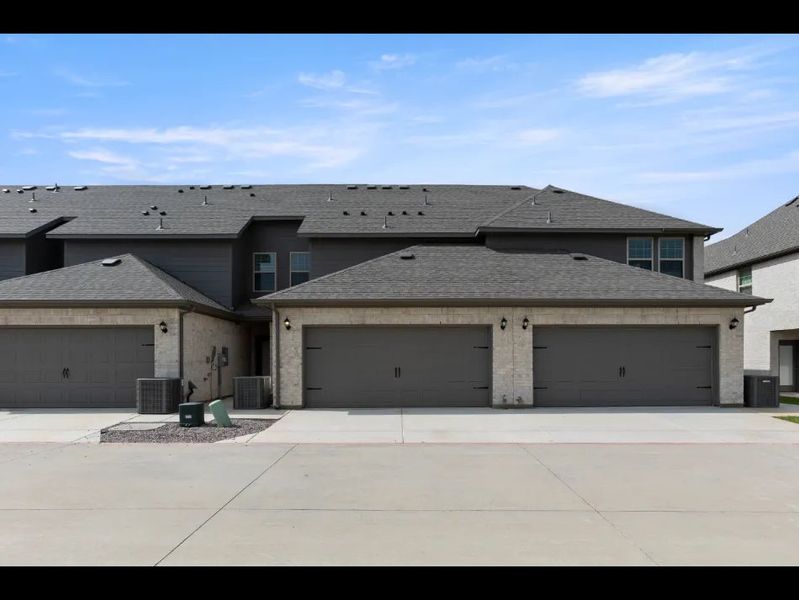 Front exterior of a new home in Sanger Circle, Sanger, TX, highlighting curb appeal (Image 28).