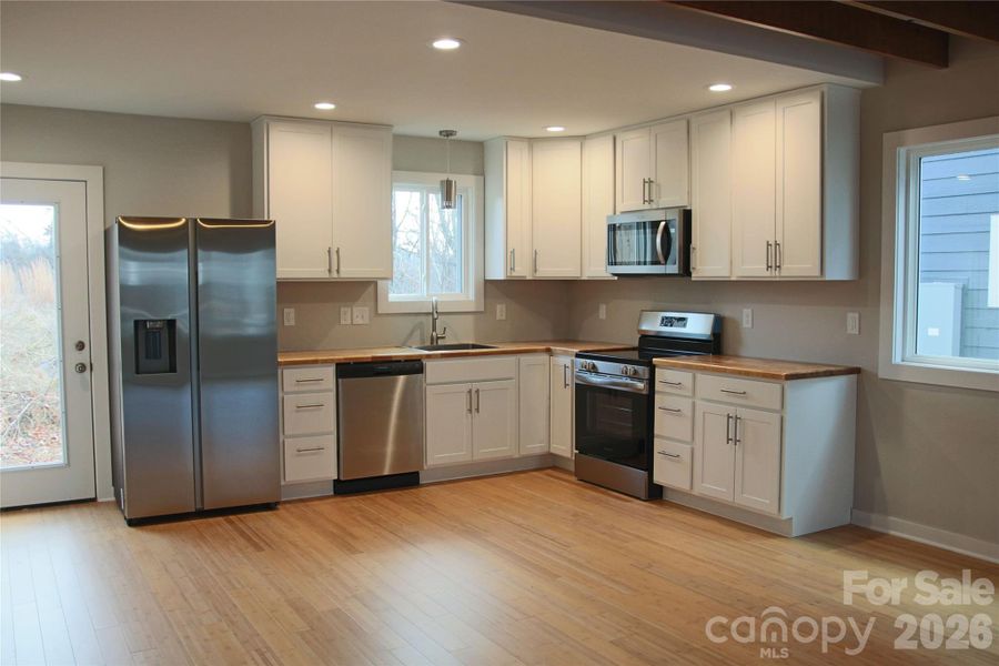 Furnished interior view inside a new home in , Asheville (Image 5).