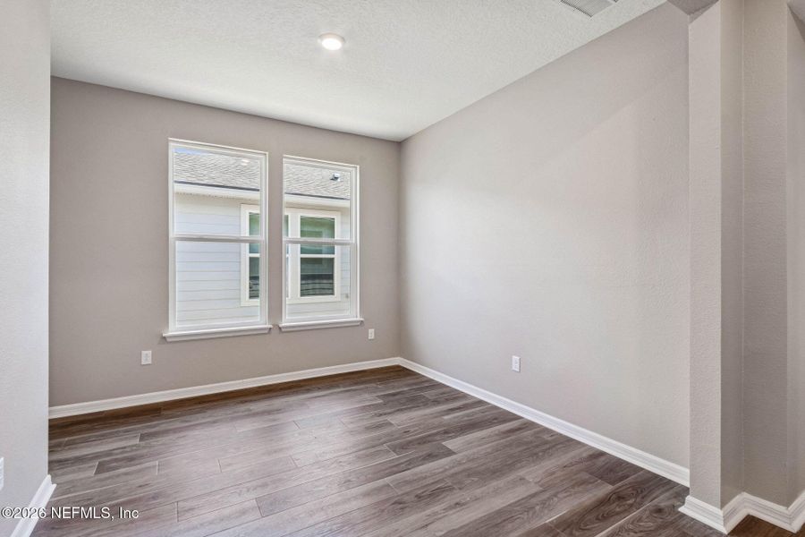 Spacious, unfurnished interior of a new home in Del Webb Wildlight, Wildlight (Image 33).