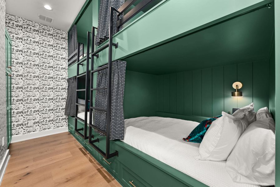 Bunk room with 4 built-in full beds (lights + chargers) Bunk room with 4 built-in full beds (lights + chargers)