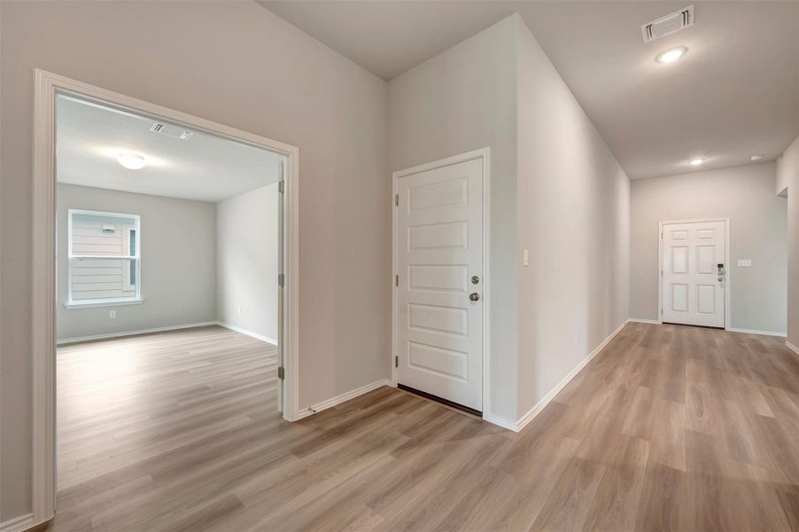Spacious, unfurnished interior of a new home in Carillon, Manor (Image 24).