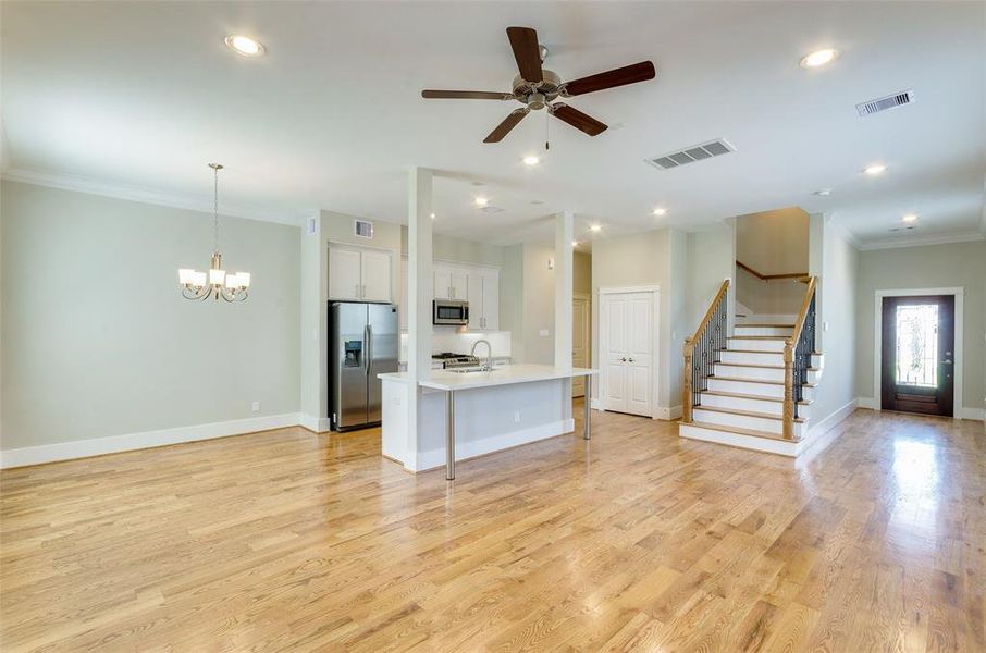 Photos from build out next door,actual kitchen features lower cabinets dark gray, uppers white