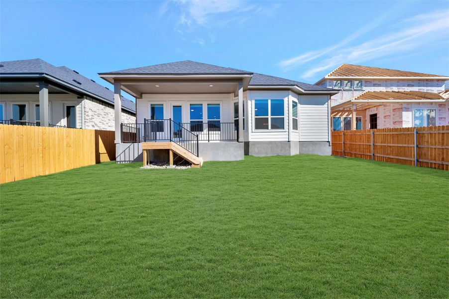Exterior details and patio area of a home in Heritage, Dripping Springs (Image 3).
