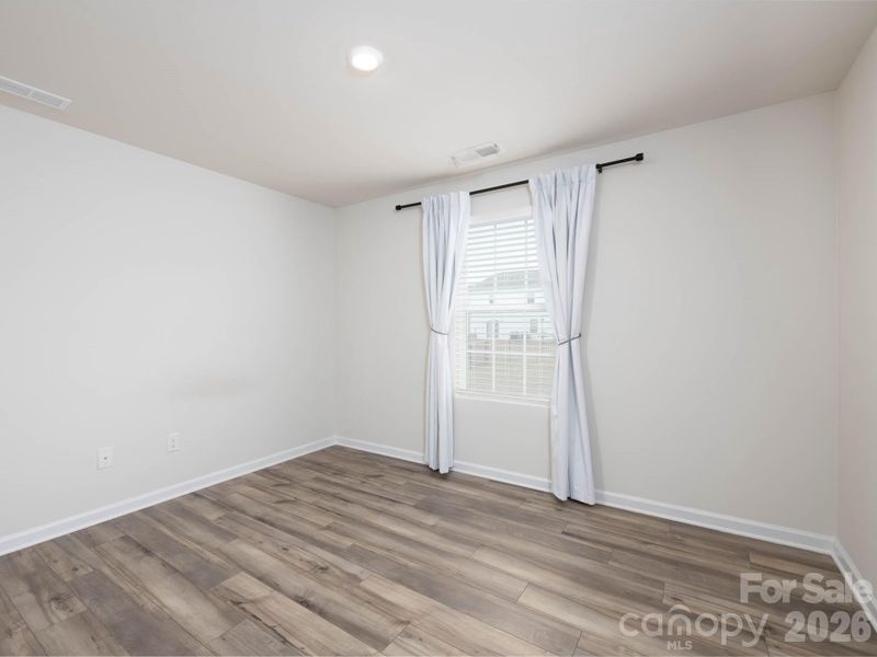 Downstairs 5th bedroom is perfect for guests, a private home office or extra bedroom.