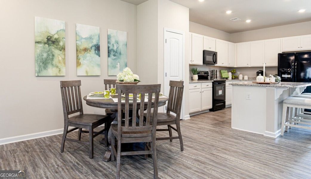 Furnished interior view inside a new home in The Cottages of Silvertown, Thomaston (Image 5).