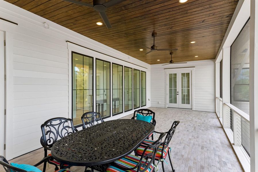 Exterior details and patio area of a home in Daniel Island Park, Charleston (Image 35).