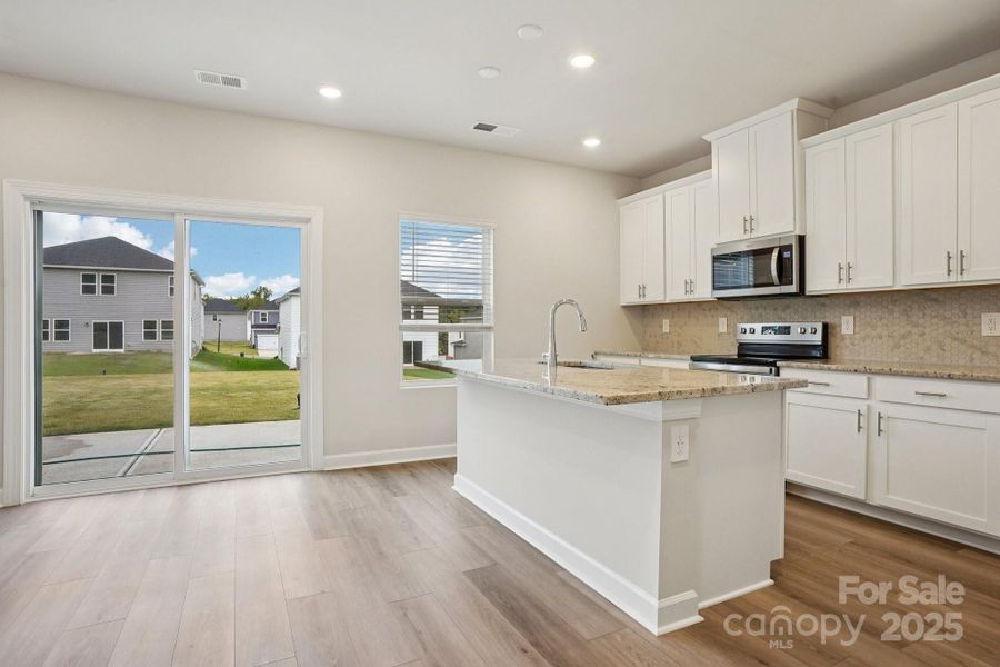Furnished interior view inside a new home in Harper Landing, Stanley (Image 12).