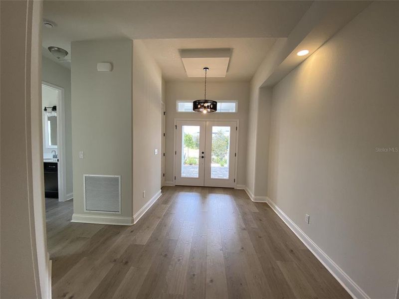 Spacious, unfurnished interior of a new home in The Reserve at Victoria, Deland (Image 10).