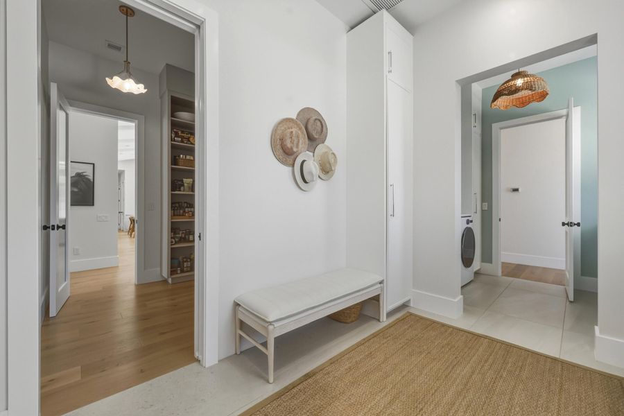 Mudroom to pantry access & laundry access with pocket door