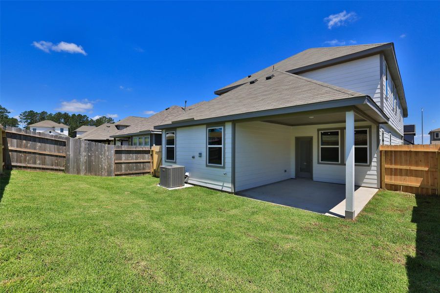 Exterior details and patio area of a home in Mostyn Springs, Magnolia (Image 3).