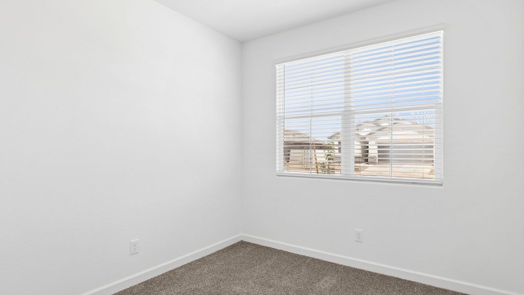 Representative unfurnished interior of a home built from the Raven by D.R. Horton in Magma Ranch Vistas, Florence (Image 14).