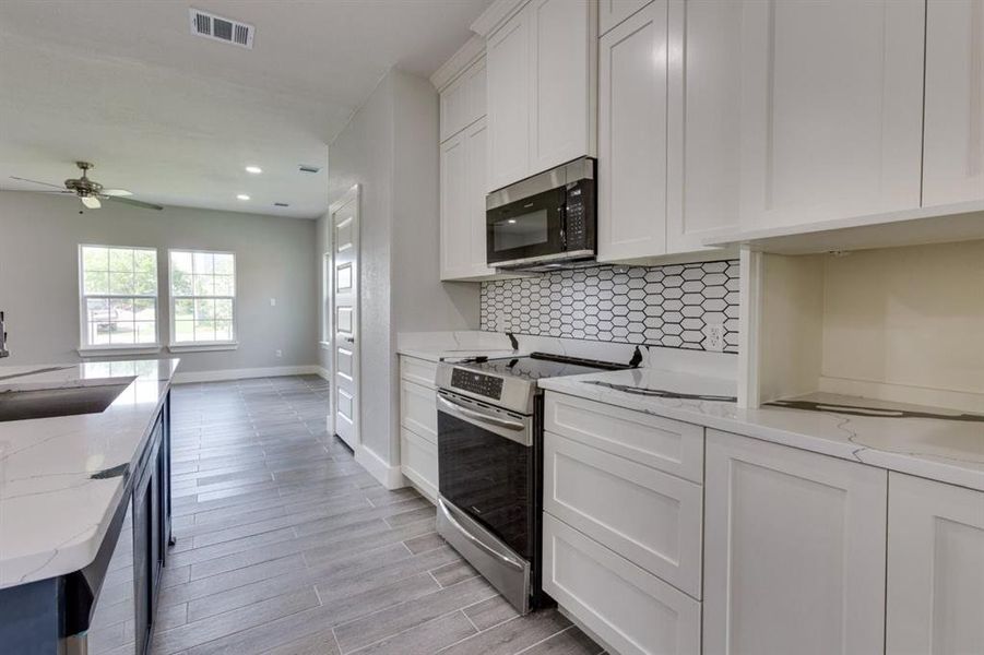 Furnished interior view inside a new home in , Ferris (Image 10).