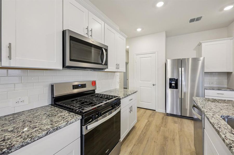 Furnished interior view inside a new home in Parks at Foster Crossing - Spring Series, Anna (Image 11).
