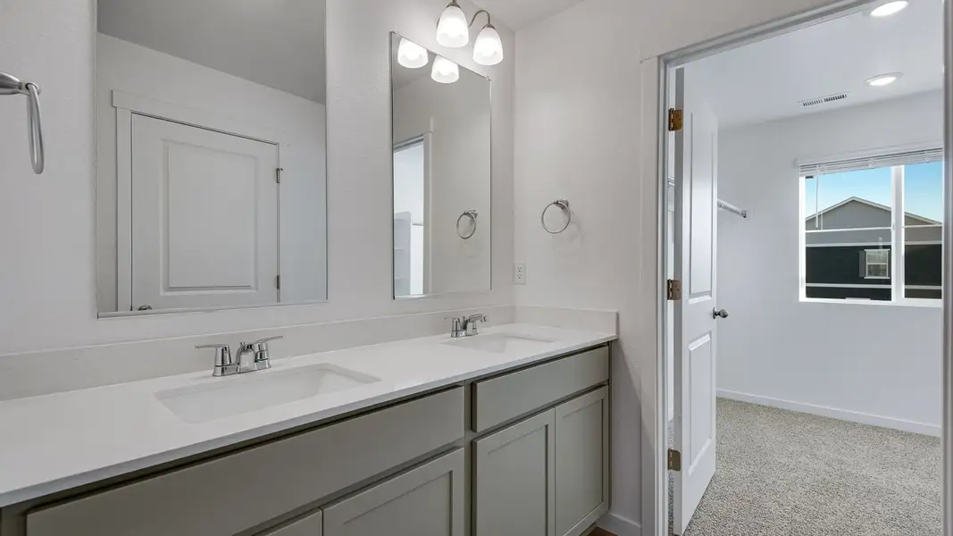 Furnished interior view inside a new home in Sky Ranch, Watkins (Image 9).