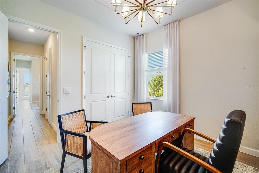 Furnished interior view inside a new home in Calusa Country Club, Lakewood Ranch (Image 27).