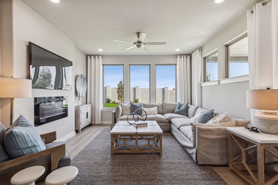 Living room in the Wimbledon home plan by Trophy Signature Homes – REPRESENTATIVE PHOTO