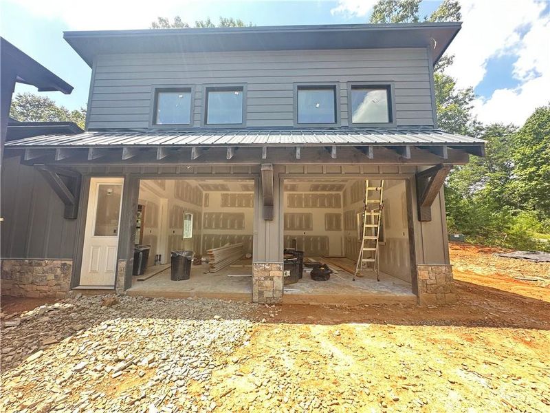 Front exterior of a new home in , Morganton, GA, highlighting curb appeal (Image 13).