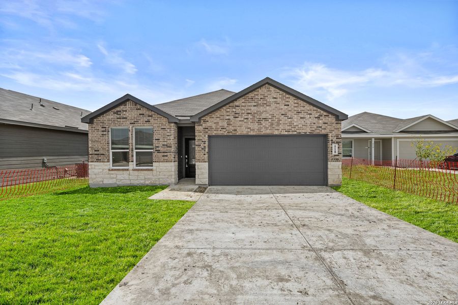 Front exterior of a new home in Mission del Lago, San Antonio, TX, highlighting curb appeal (Image 1). Front exterior of a new home in Mission del Lago, San Antonio, TX, highlighting curb appeal (Image 1).