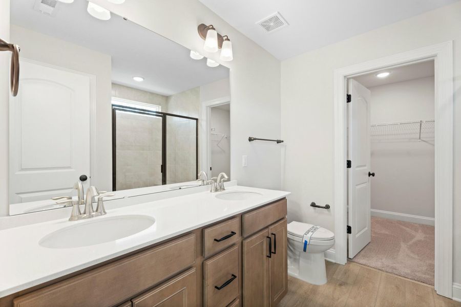 Furnished interior view inside a new home in Cottages at Piper Village, Trinity (Image 10).