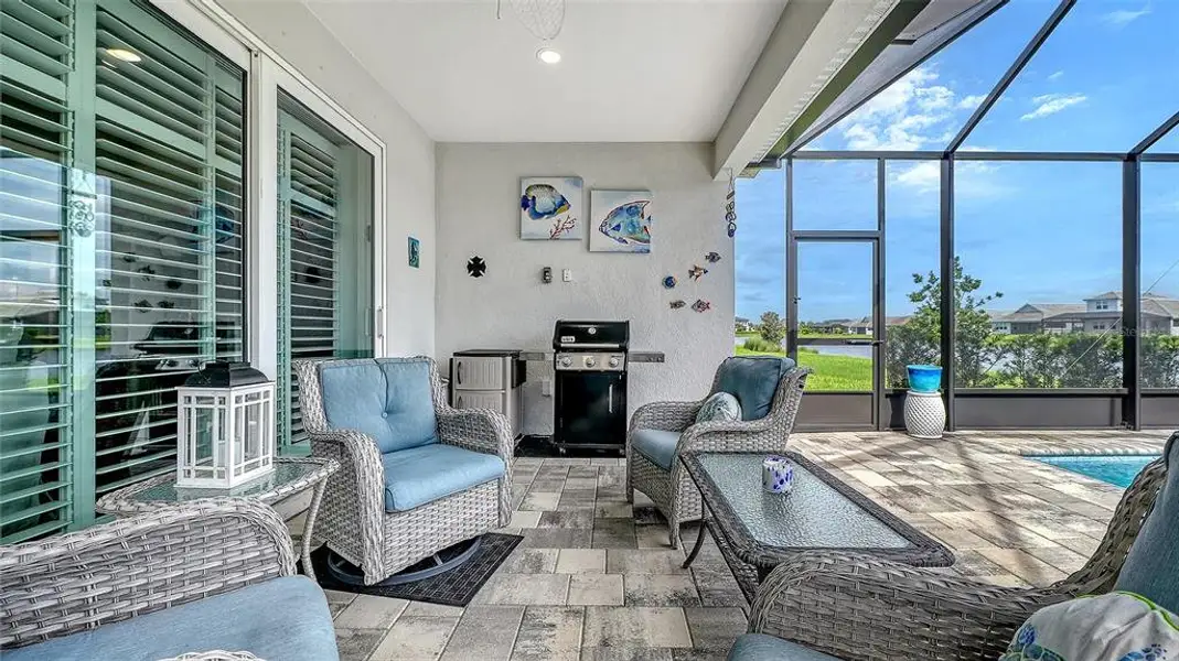 Exterior details and patio area of a home in LakeHouse Cove at Waterside, Sarasota (Image 28). Exterior details and patio area of a home in LakeHouse Cove at Waterside, Sarasota (Image 28).
