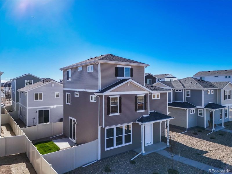 Exterior details and patio area of a home in Muegge Farms, Bennett (Image 27).