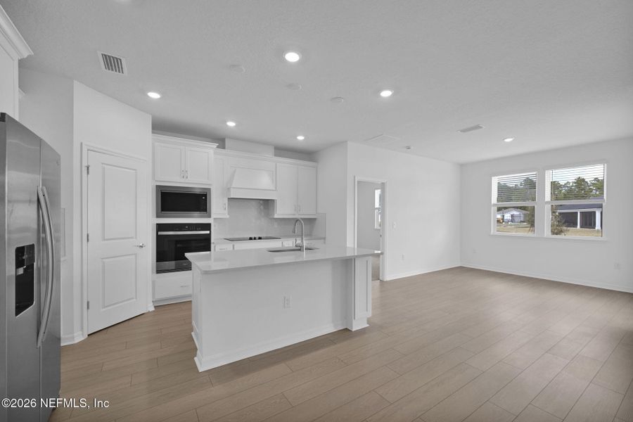 Furnished interior view inside a new home in Hyland Trail, Green Cove Springs (Image 9).