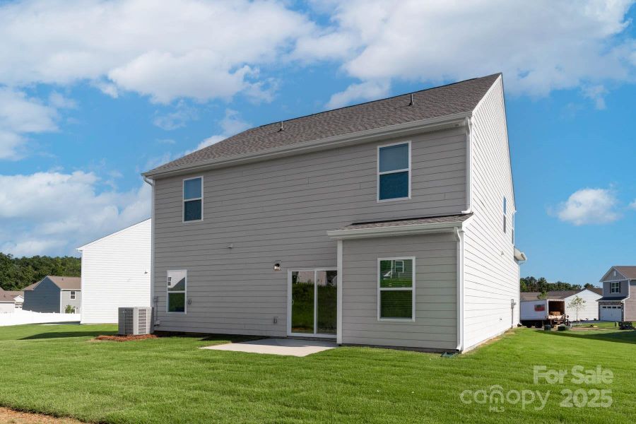 Exterior details and patio area of a home in Colonial Crossing, Troutman (Image 3).