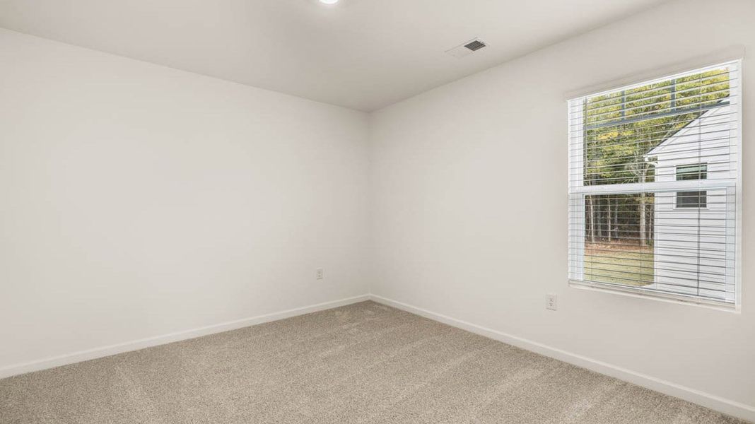 Representative unfurnished interior of a home built from the Dennis by D.R. Horton in Glenmaye, Hampton (Image 34).