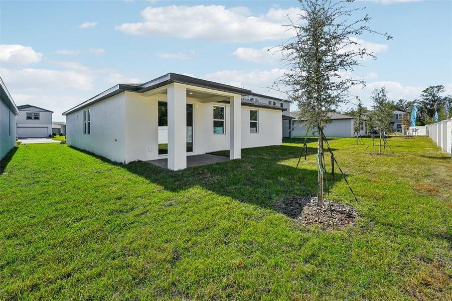 Exterior details and patio area of a home in Fox Pointe at Rivers Edge, Leesburg (Image 16).