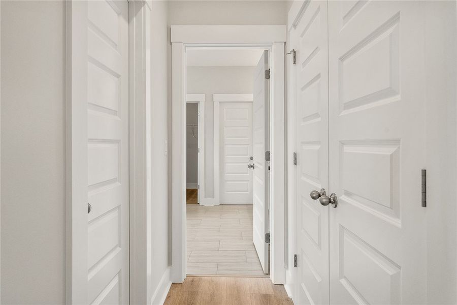 Clean lines define this hallway, featuring a blend Clean lines define this hallway, featuring a blend