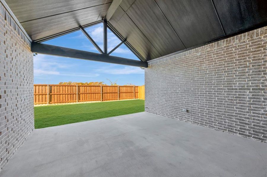 Exterior details and patio area of a home in Elevon, Lavon (Image 2).