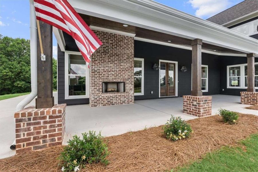 Exterior details and patio area of a home in , Roopville (Image 38).