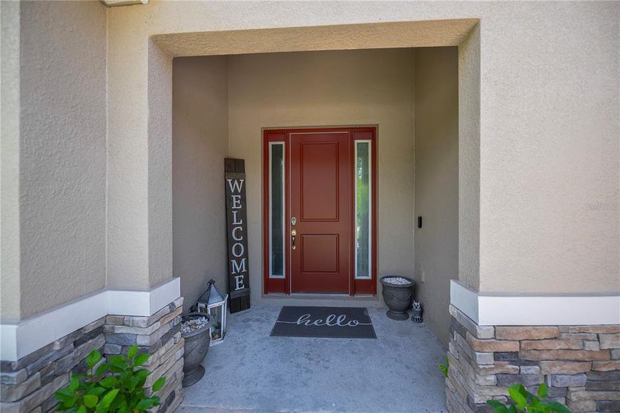 Exterior details and patio area of a home in , North Port (Image 27).