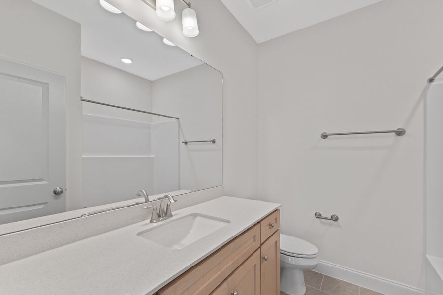 Representative furnished interior of a home built from the The Hemlock by RobuckHomes in Kennebec Crossing, Angier (Image 87).