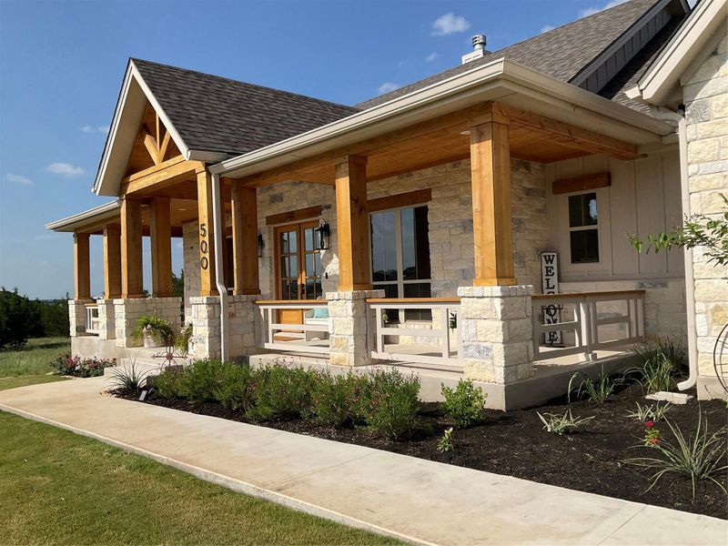 Front exterior of a new home in , Liberty Hill, TX, highlighting curb appeal (Image 19).